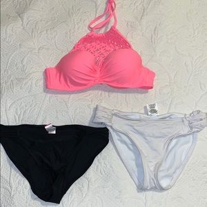 Pinky bathing suit top and black,white bottoms